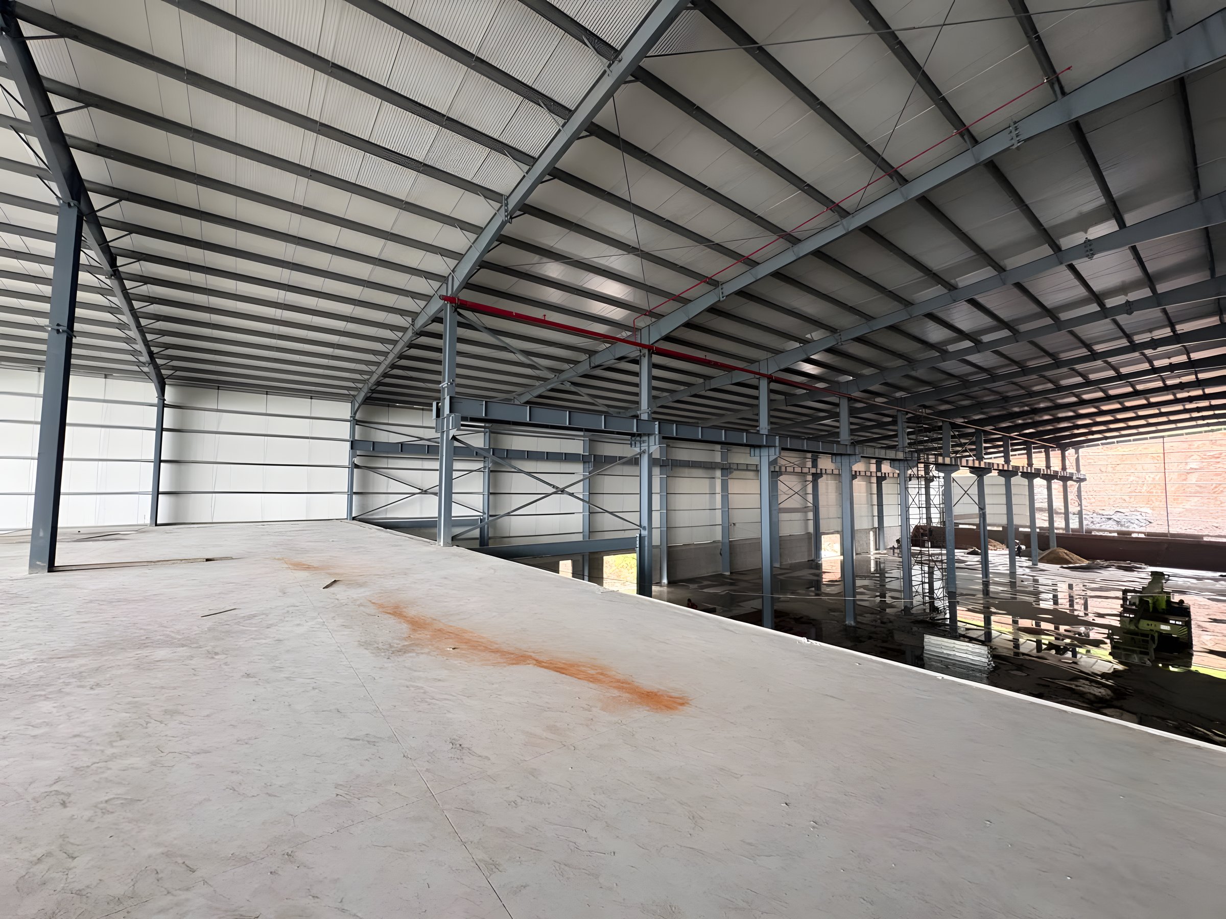 Steel mezzanine floor inside a PEB shed by AcuFabInfraStructure
