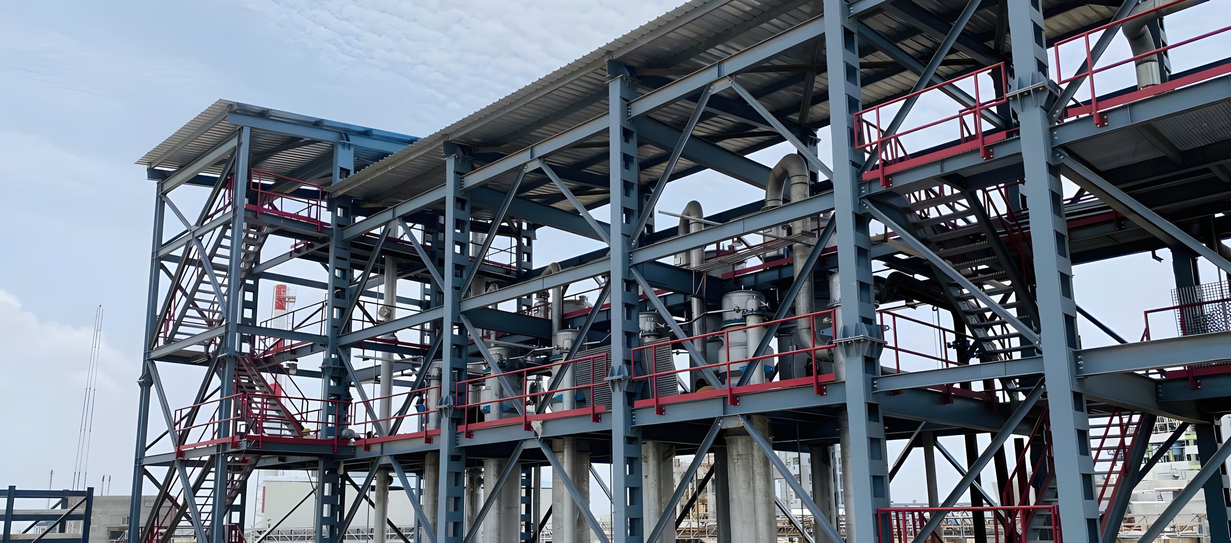 Multi-level steel platform framing with stairs and handrails by AcuFabInfraStructure